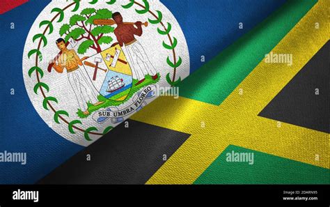 Belize And Jamaica Two Flags Textile Cloth Fabric Texture Stock Photo