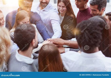 Young College Students Teamwork Stacking Hand Concept Stock Image