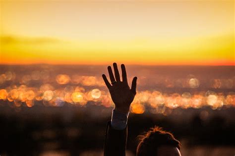 Hand Reaching Sunset Sky Landcape Man Stock Photo - Download Image Now - iStock