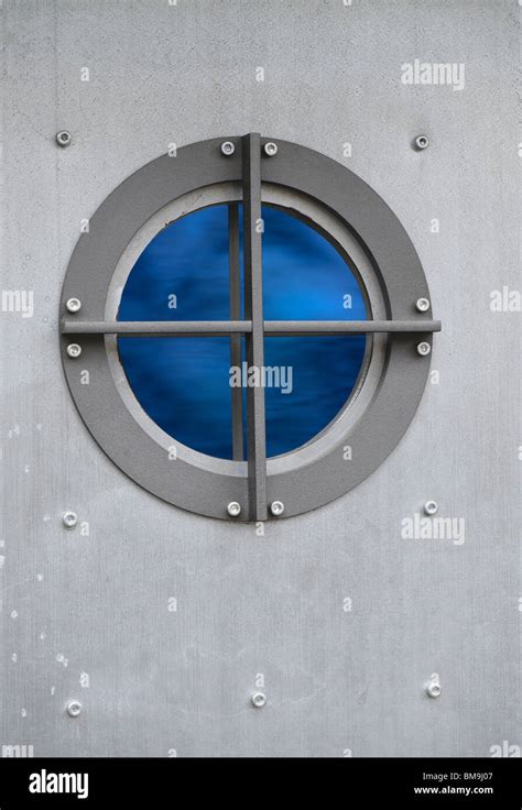 Silver Metal Door With Porthole Window With View On Sea Stock Photo Alamy