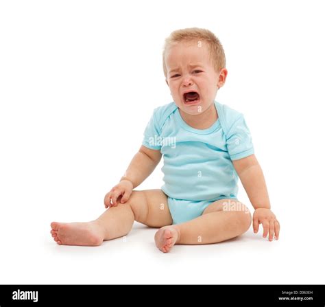 Sad baby boy sitting and crying Stock Photo - Alamy