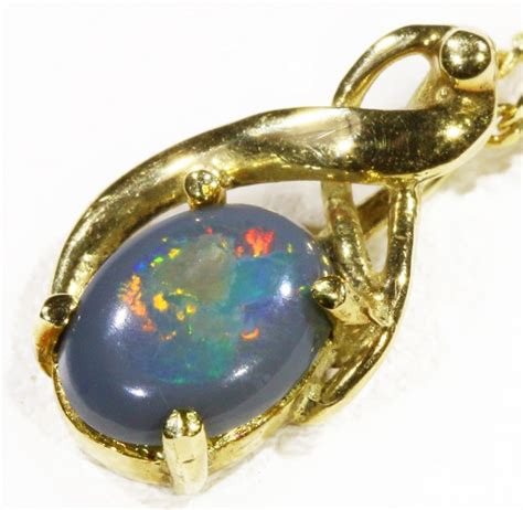 Black Opal Set In 18k Gold Pendant CF 1186