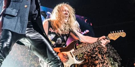 Janick Gers' Guitar Accidentally Flies Into Crowd at Iron Maiden Show