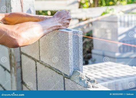 Worker Masonry Are Building Walls With Cement Blocks And Mortar Stock Image Image Of Brick