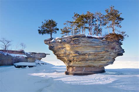 Winter at Port Austin's Turnip Rock Photograph by Craig Sterken - Fine Art America