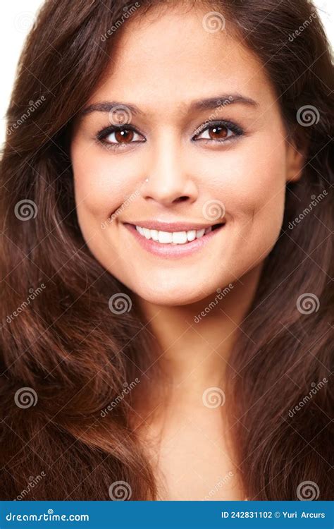 Youthful Beauty Studio Portrait Of A Beautiful Smiling Brunette Stock