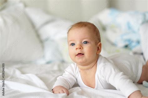 Baby with blue eyes Stock Photo | Adobe Stock