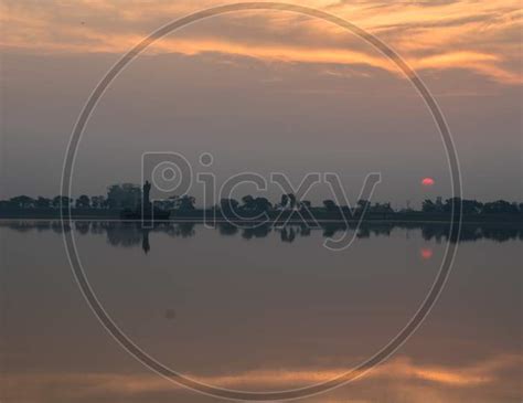 Image Of Sunset Or Sunrise Over Hussain Sagar Lake At Tank Bund