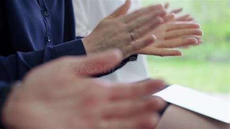 Diverse Business Team Clapping Hands While Sitting At Conference Or