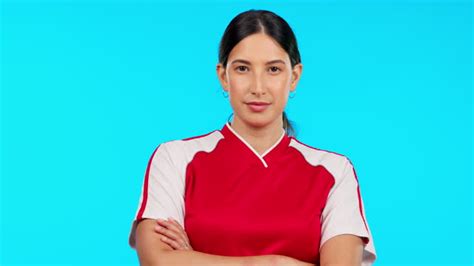 Ready Sport And Face Of A Woman With Arms Crossed Isolated On A Blue