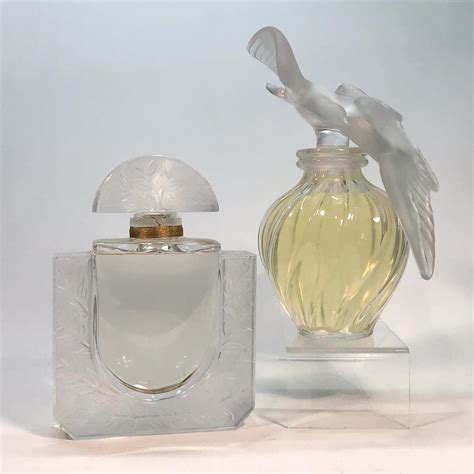 Lot Two Lalique Frosted And Clear Glass Factice Perfume Bottles Lair Du Temps And Chevrefeuille