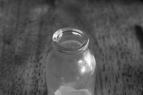 Premium Photo High Angle View Of Water In Glass Bottle On Table