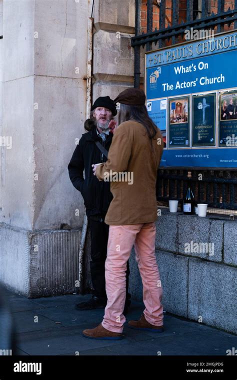 London 02 27 2022 Two Homeless People In Covent Garden Talking And