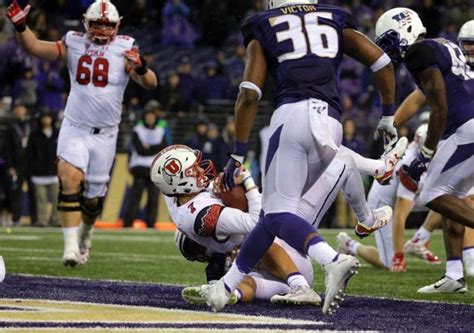 the football players are playing on the field