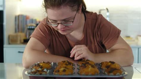 Down Syndrome Woman Cant Resist Homemade Cupcakes Shot With Red