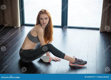 Fitness Redhead Woman Sitting On The Floor Stock Image Image 63050137