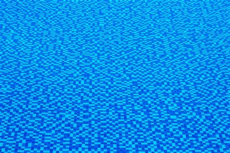 Premium Photo | View of nice blue tile in swimming pool water surface