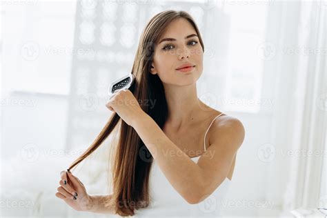 Woman Brushing Her Hair