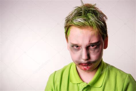 Teenager boy with a zombie makeup on Halloween — Stock Photo © Dantyya ...