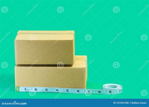 Cardboard Boxes With Tape Measure Stock Photo Image Of Measure Hand