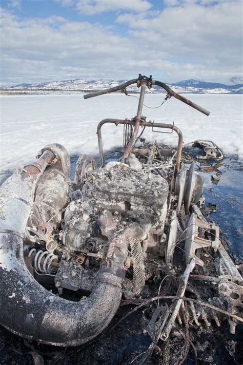 Bizarre Burnt Out Snowmobile On Yukon Lake Canada Stock Image Image