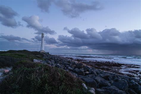 A Lighthouse by the Sea · Free Stock Photo