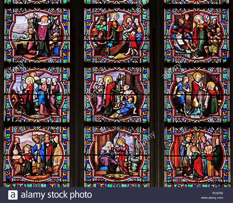 Scenes from the life of St. Genevieve, stained glass window in Church ...