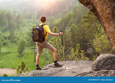 Backpacker go up mountain stock image. Image of nature - 42564727