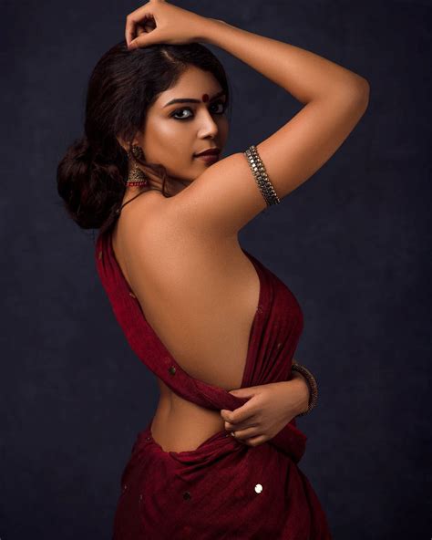 Raksha Cherin Sizzling Stills In Blouse Less Saree South Indian Actress