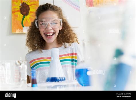 Girl making science experiment Stock Photo - Alamy