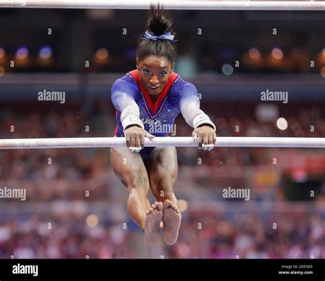 June 25, 2021: Simone Biles performs on the uneven parallel bars during ...