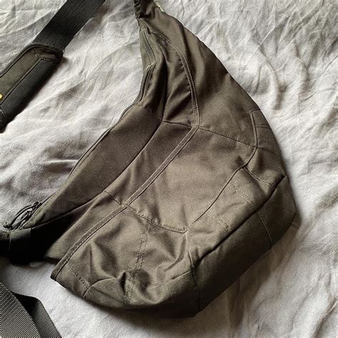 LowePro expandable panelled sling bag. Insanely cool... - Depop