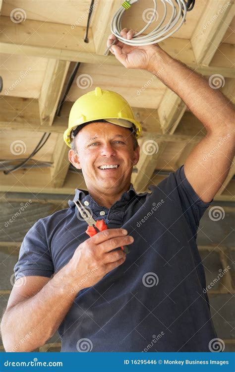 Electrician Working On Wiring Stock Photo Image Of Indoors Vertical