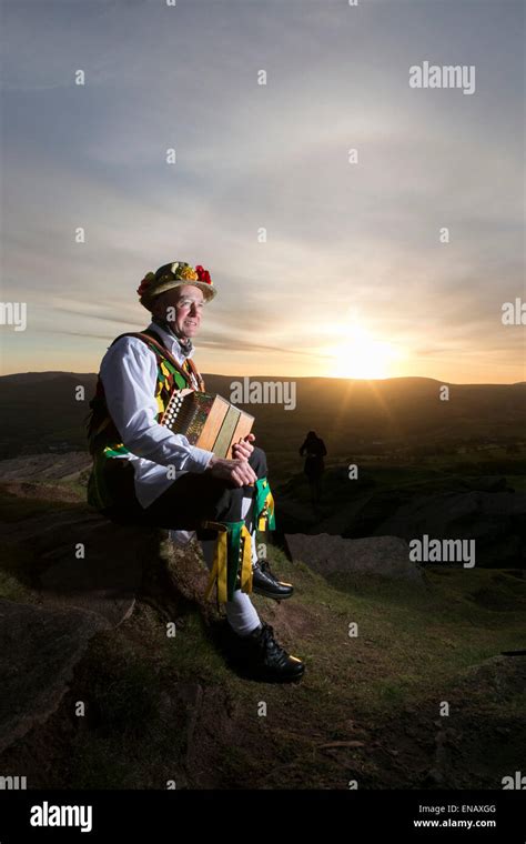 Morris dancers from the Chapel-en-le-Frith Morris Men dance at sunrise ...