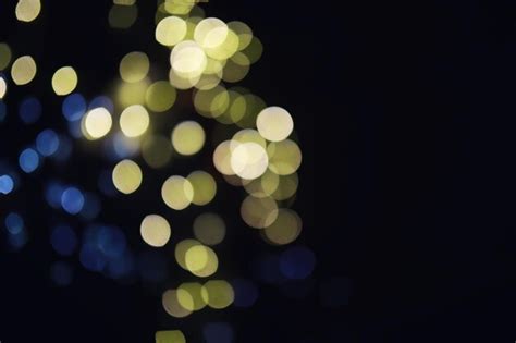 Premium Photo Abstract Bokeh Background Golden Bokeh Circles On Dark