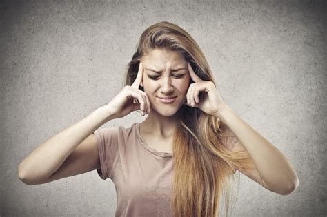 Premium Photo Young Woman Thinking Hard