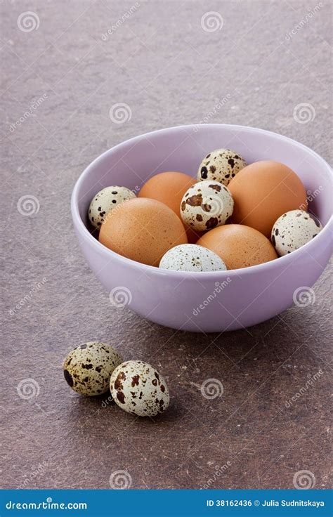 Chicken And Quail Eggs By Easter In A Ceramic Bowl Stock Photo Image