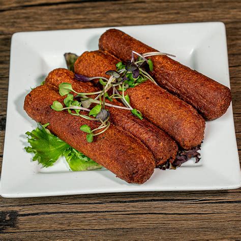 Alcapurrias (PUERTO RICAN BEEF FRITTERS) - Mofongo Restaurant