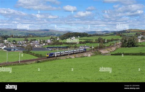 Northern Rail Caf Class 195 Diesel Multiple Unit Train On The West Coast Mainline Passing The