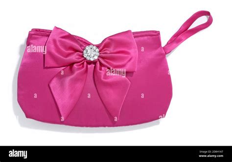 Fuchsia Satin Clutch With Bow And Rhinestones Photographed On A White