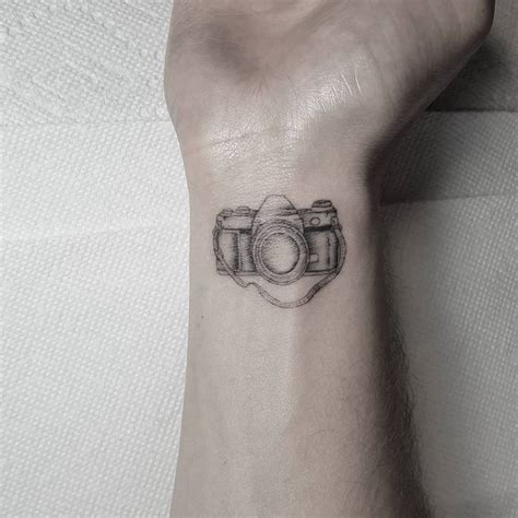 Camera Tattoo Located On The Wrist Illustrative Style