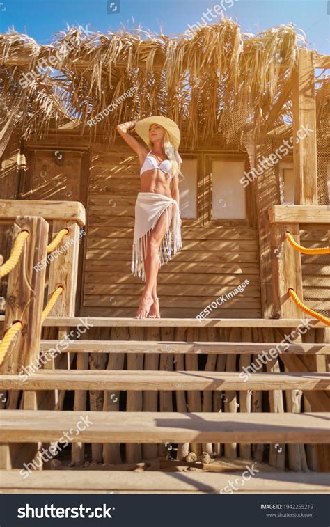 Sexy Woman Wearing Bikini Standing Lounger库存照片1942255219 Shutterstock