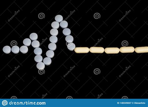 Medicines White Round Heart Shaped Pills On Black Background Tablets