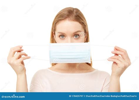 Beautiful Blond And Young Woman Holding A Face Mask Stock Image Image