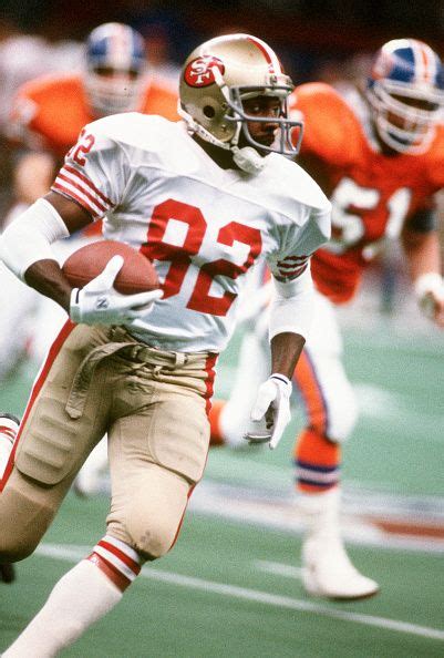 John Taylor Of The San Francisco 49ers Runs With The Ball Against The