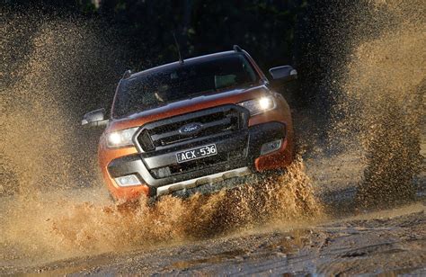 Download Stunning Ford Ranger On A Scenic Mountain Road Wallpaper