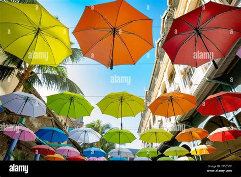 Colorful Hanging Umbrellas In Caudan Waterfront Mauritius Africa Stock