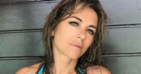 Elizabeth Hurley Strips Off To Tiny Bikini To Flaunt Figure As She