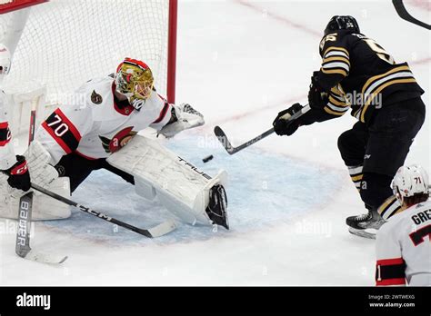 Boston Bruins Right Wing Justin Brazeau 55 Hits The Puck Past Ottawa