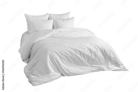 Bed with white bedlinen Isolated on white background. Side view. Stock ...